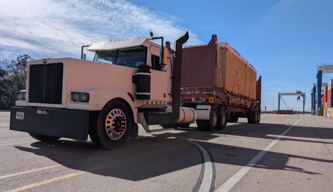 AIM port tractor with container chassis at the terminal